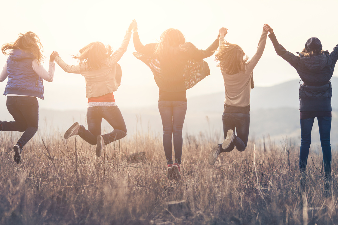 Group of friends jumping